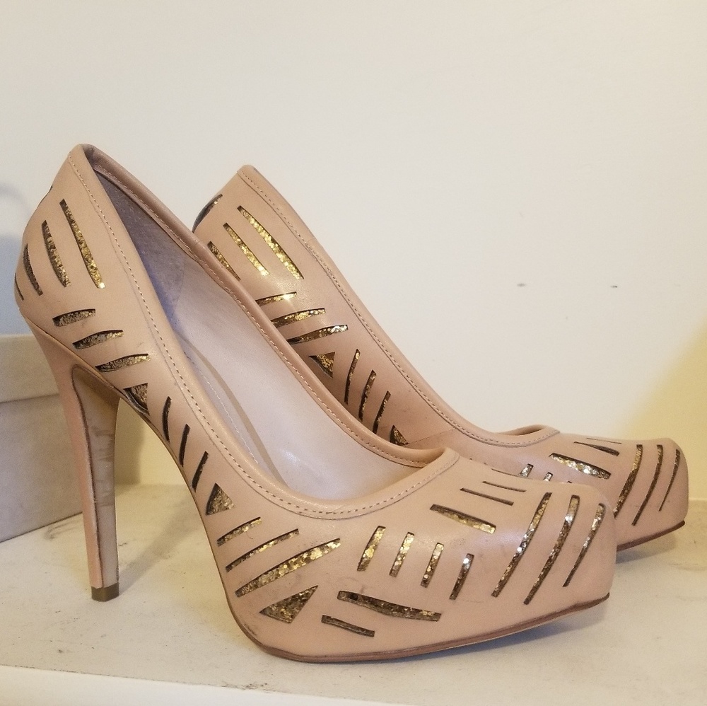 Beige and gold pumps